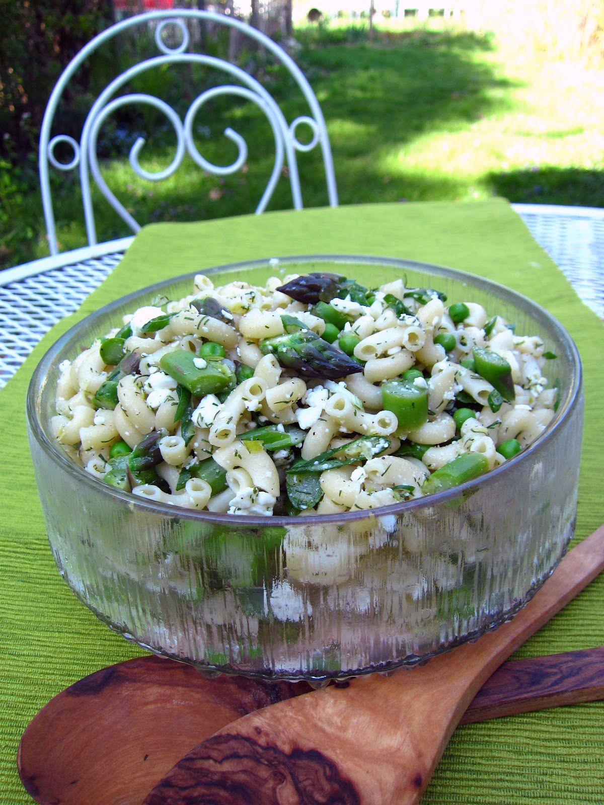 Bowl of asparagus pasta salad with lemon and dill